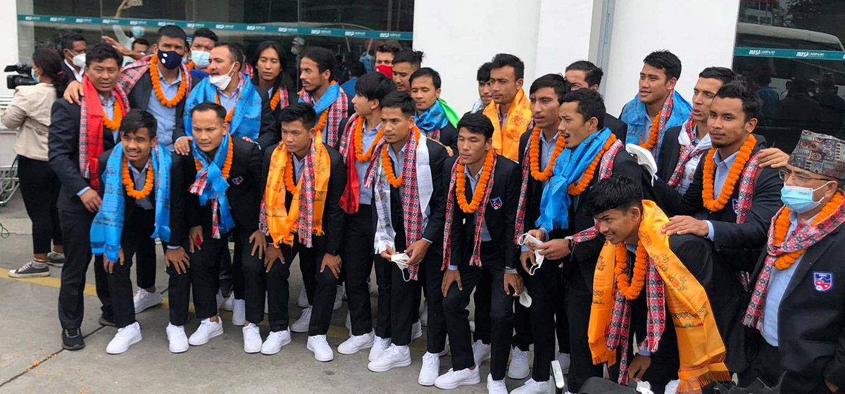 Nepali football team returns home