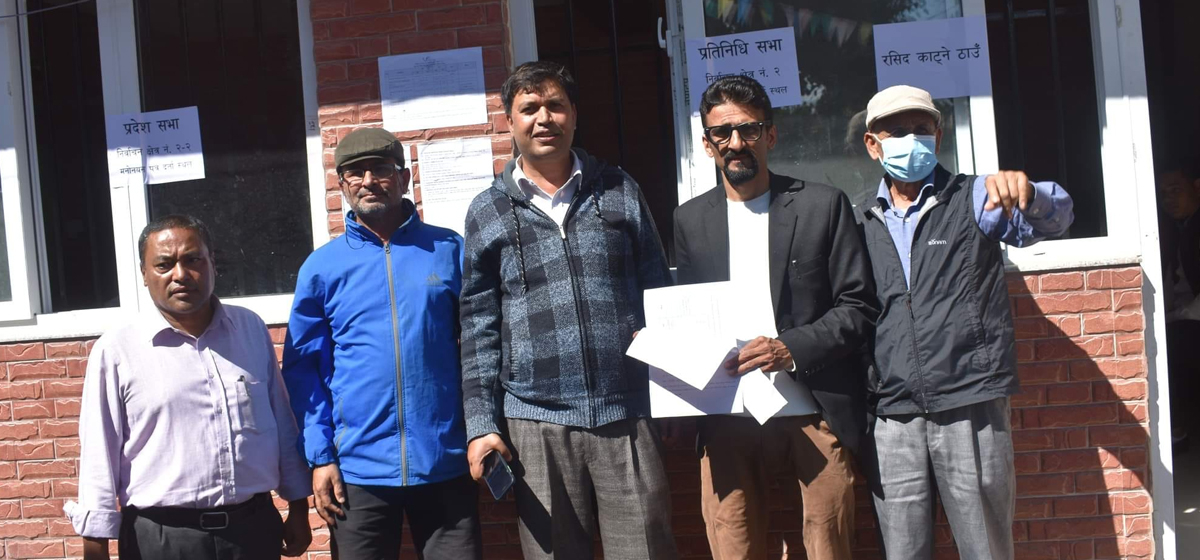 Prakash Adhikari, an independent candidate from Kathmandu-2, registers his candidacy