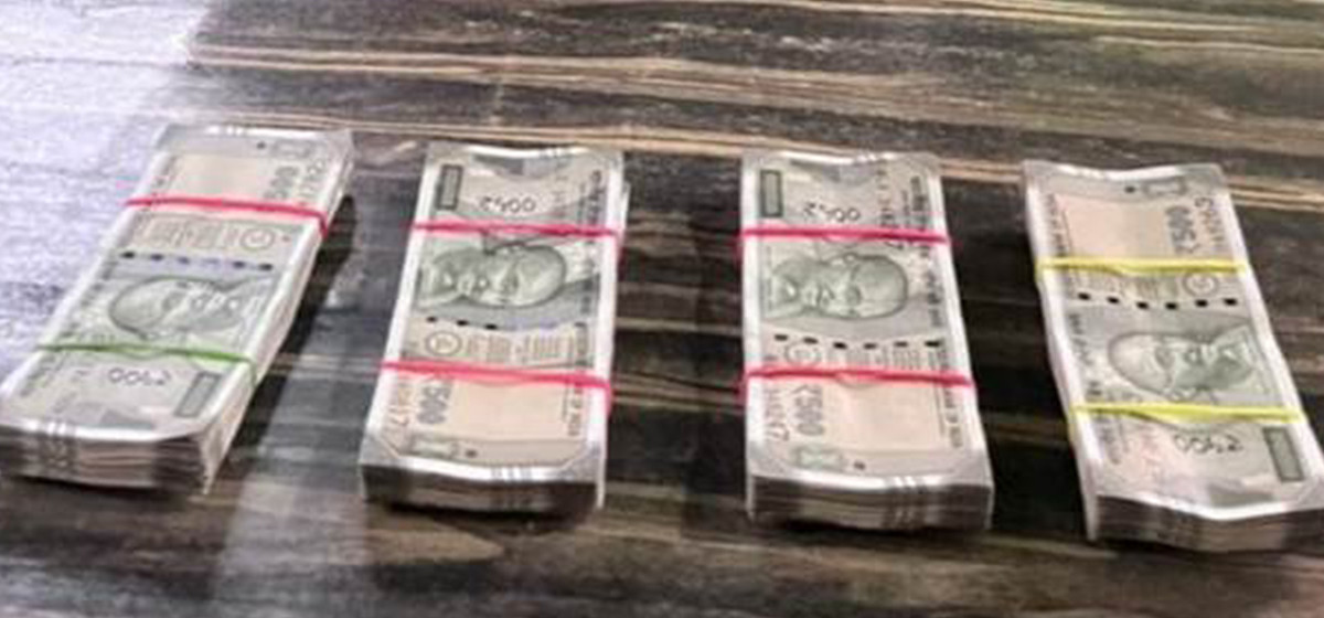 Two arrested with banned Indian currency amounting Rs 400,000