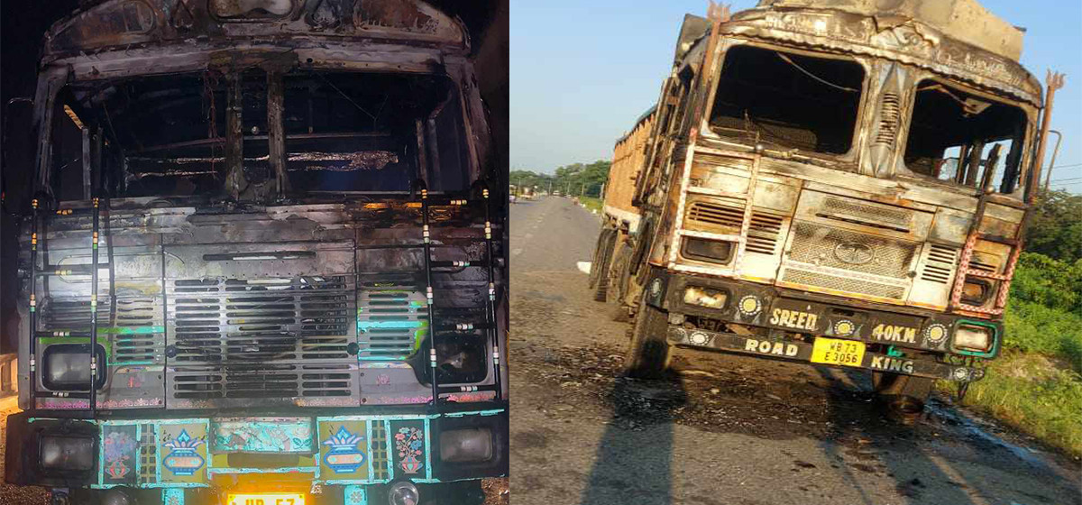 Two arrested for setting fire to Indian trucks in Jhapa