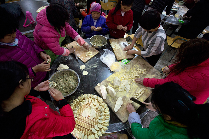 Chinese Lunar New Year feast begins with drums and dumplings