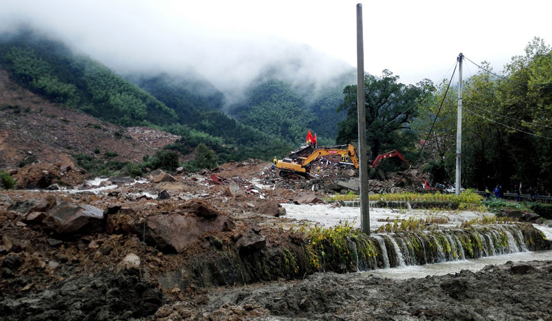 China reports 6 dead, 23 missing in typhoon landslides