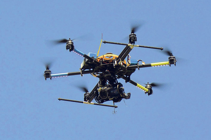 Singaporean, Spanish nationals held for flying drone camera