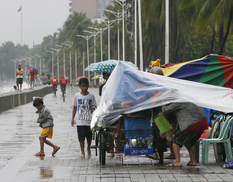 Floods kill 24 in Vietnam as Typhoon Sarika looms
