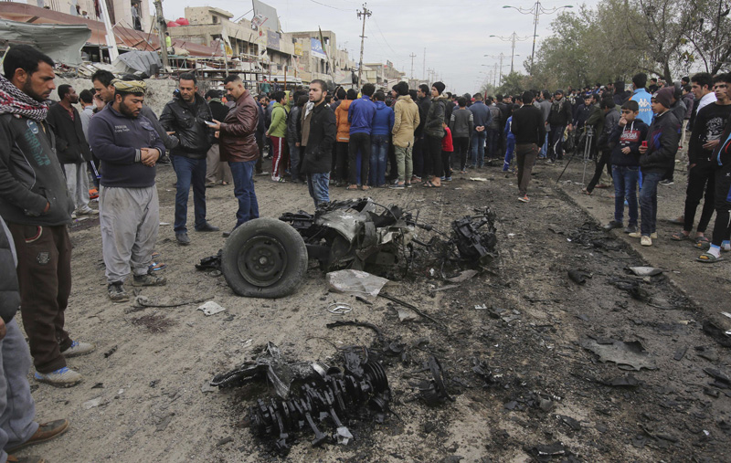 Car bomb strikes Baghdad market, killing at least 8