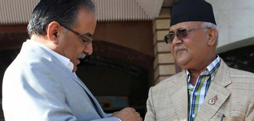 Dahal calls on PM Oli at Baluwatar