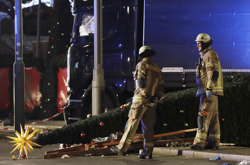 Truck rams into German Christmas market, killing 12 people