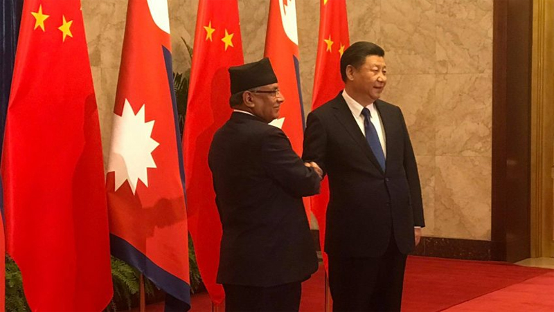 PM Dahal meets President Xi (with photo feature)