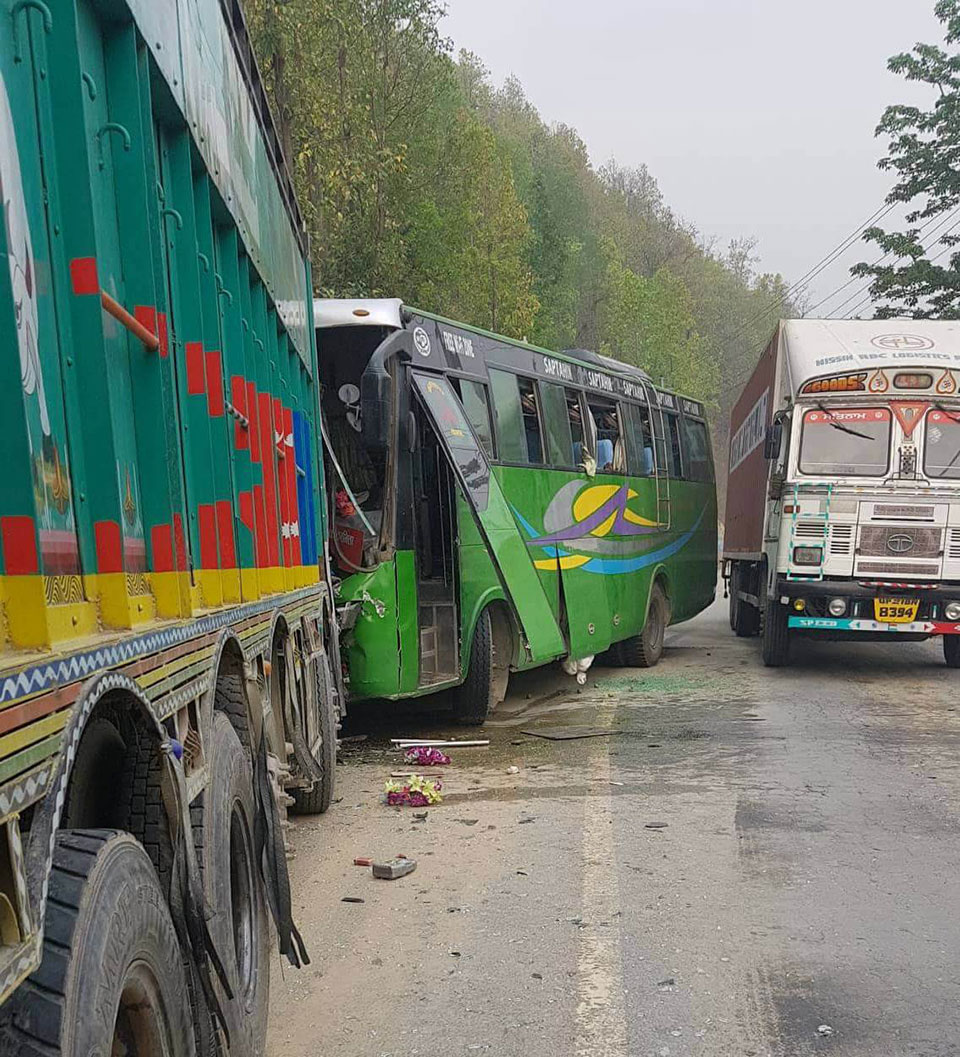 Overtaking bus rams into truck injuring 27