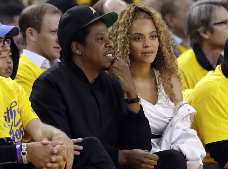 Fan charged after rushing onstage at Beyonce, Jay-Z concert