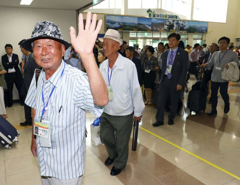 South Koreans enter North to reunite with kin split by war