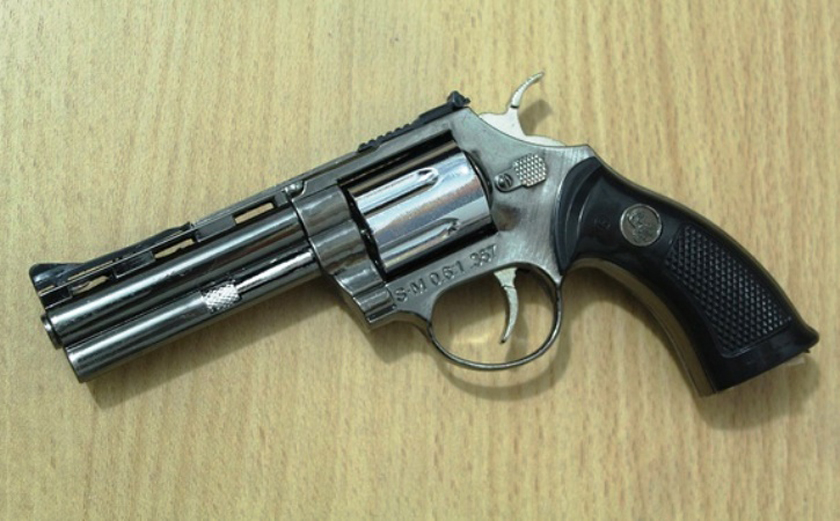 7 held in possession of pistol, bullets