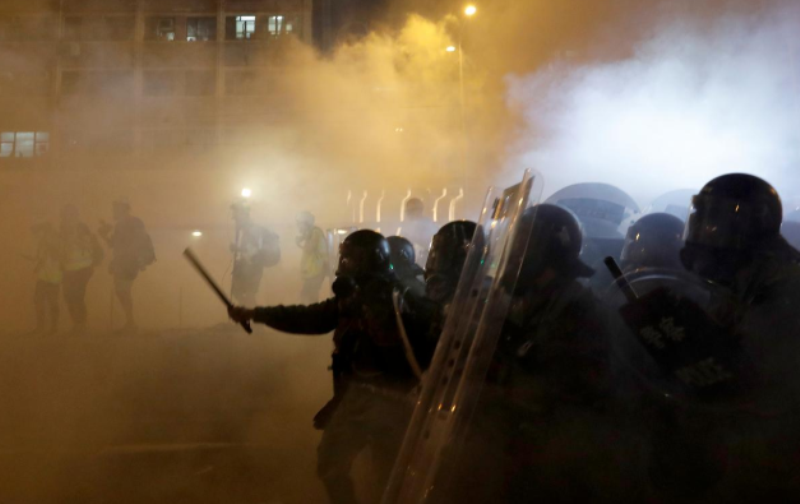 Hong Kong police fire tear gas as protests descend into chaos
