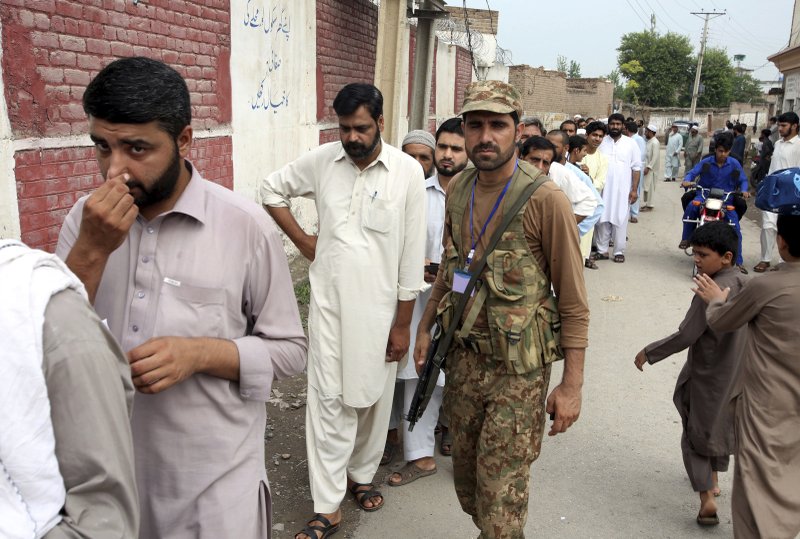 Suicide blast kills 31 as Pakistan holds general elections