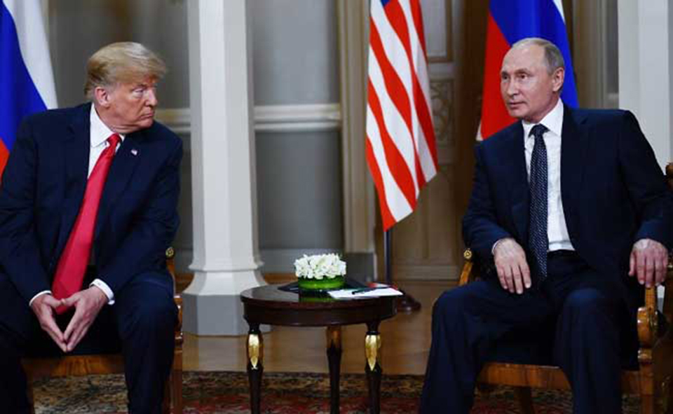 Trump sits down with Putin after denouncing past U.S. policy on Russia