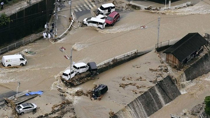 57 dead as Japan scrambles to rescue flood victims