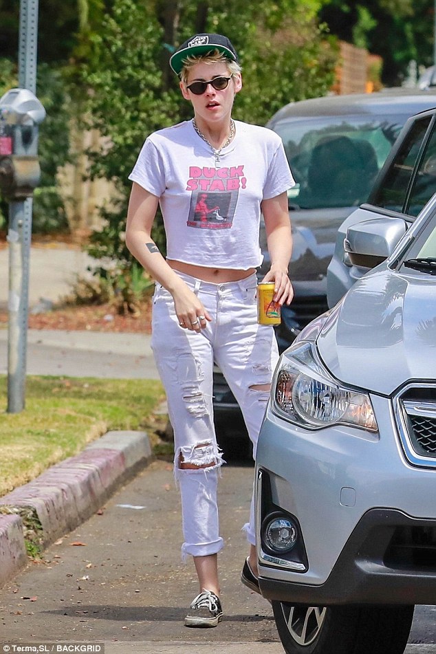 Kristen Stewart flashes slim belly as she rocks ripped jeans during LA outing with Stella Maxwell