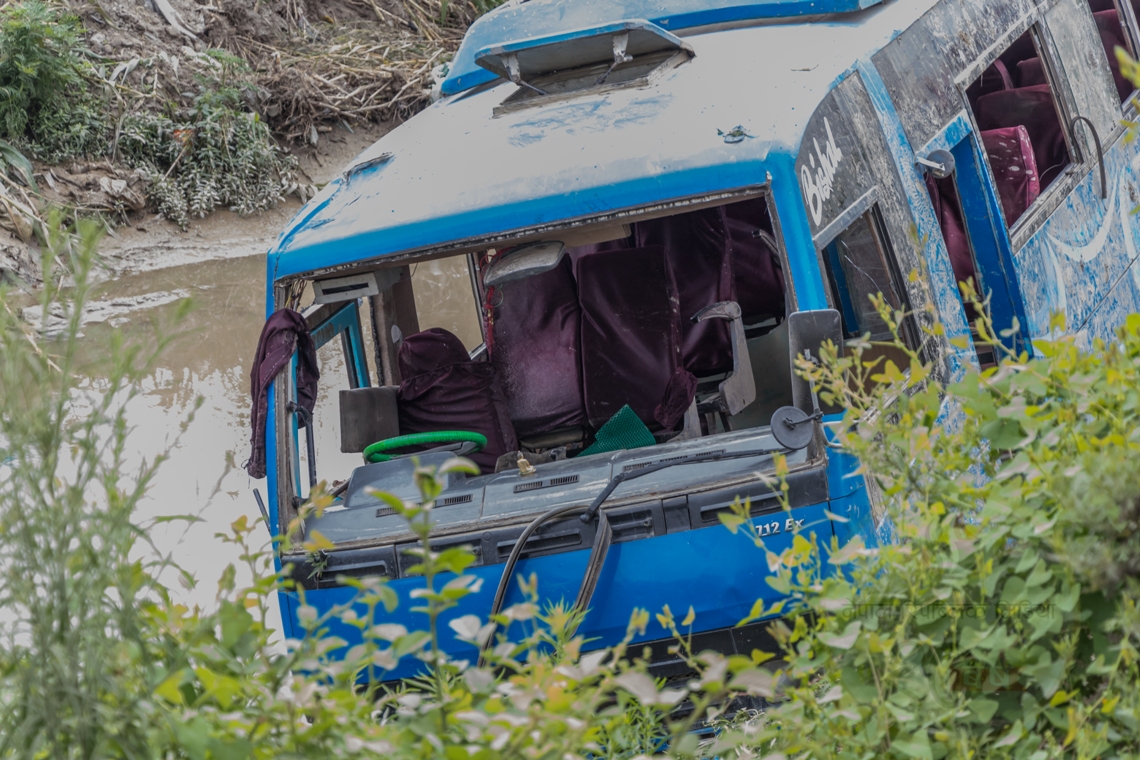 (IN PICTURES) Bus plunges into Sesmati River at Balaju
