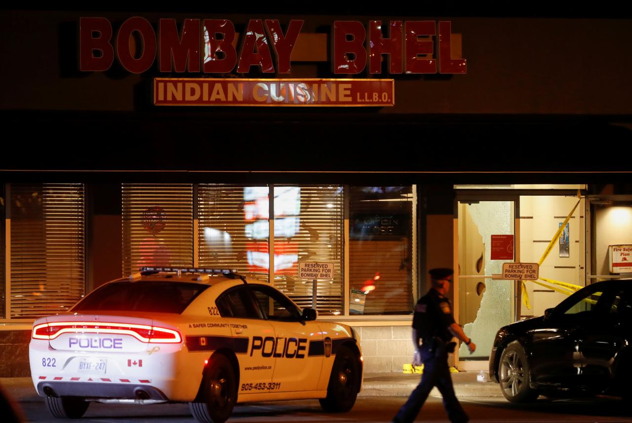 Two men set off bomb in restaurant in Canada; 15 wounded
