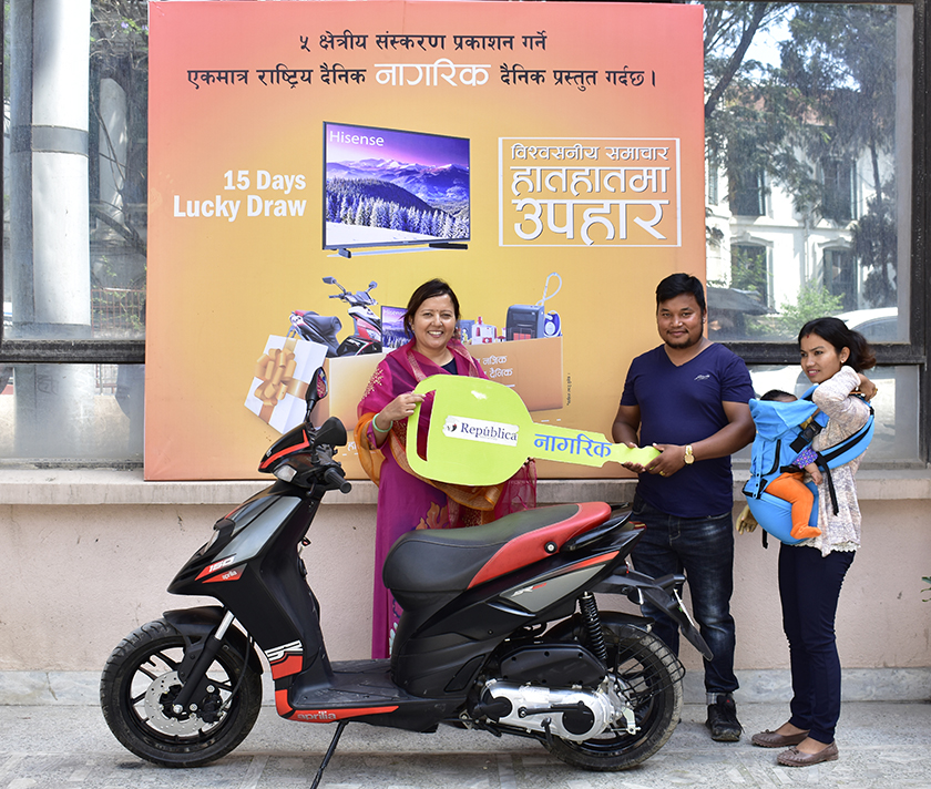 NRM lucky draw winner receives scooter