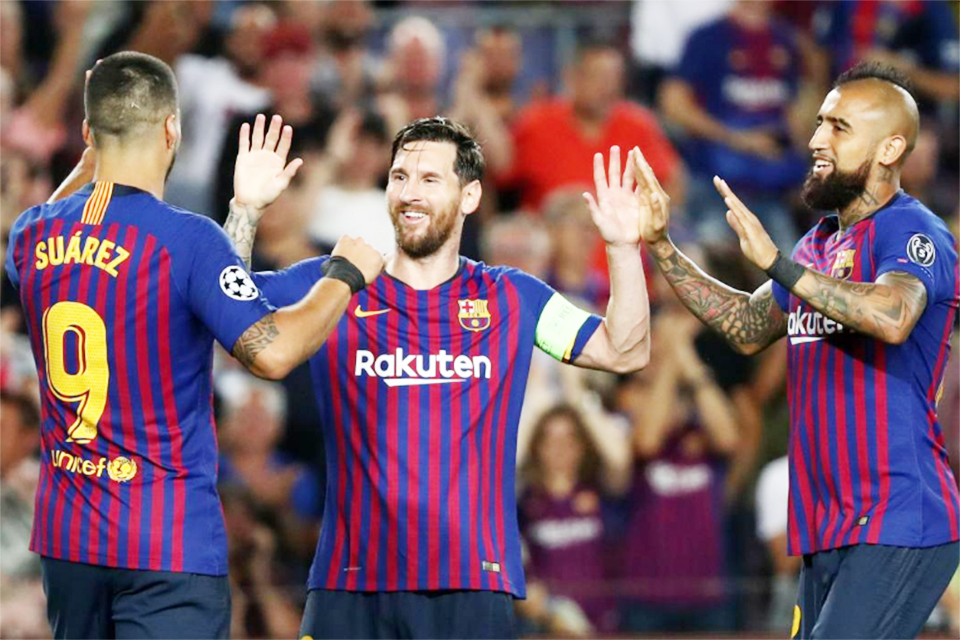 Messi hat-trick fires Barca to victory over PSV