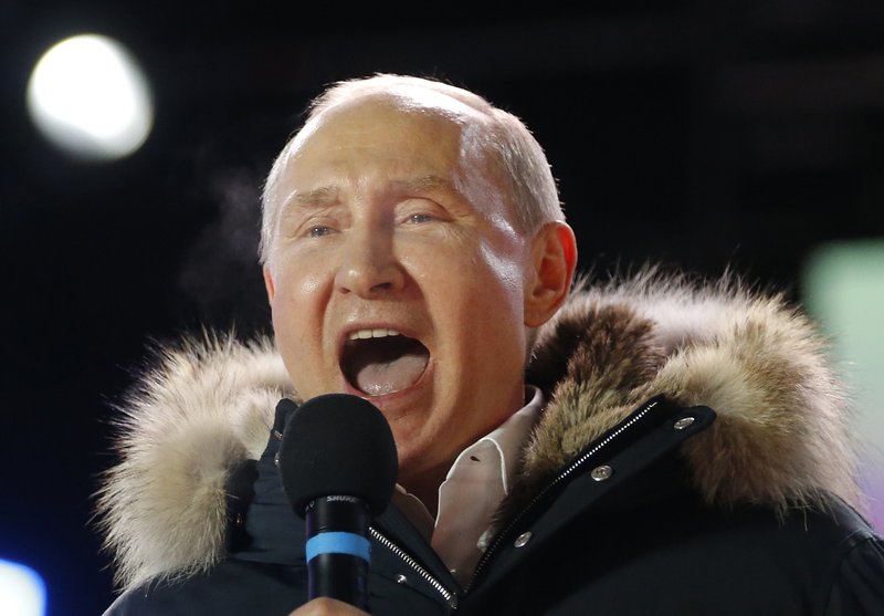 Putin claims crushing victory in Russian presidential vote