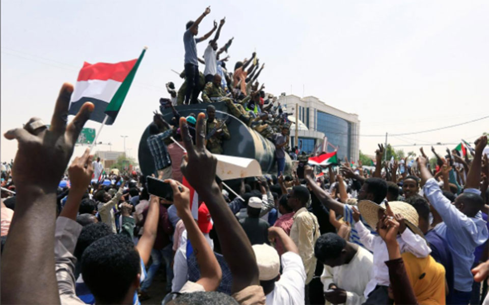 More protesters flood Sudan's sit-in to demand civilian rule