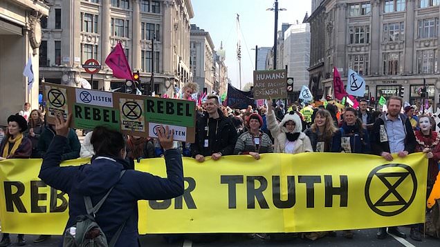 UK police arrest more than 200 in climate change protests
