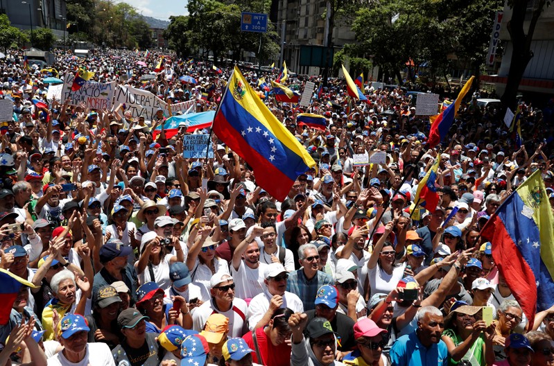Venezuelans rally to demand power, water and end to Maduro