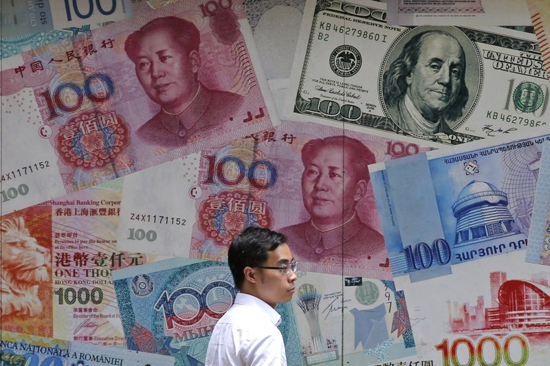 China’s yuan falls below sensitive level of 7 to US dollar