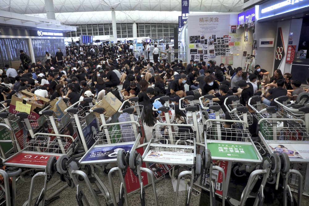 Protesters cripple Hong Kong airport for a 2nd day