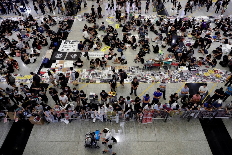 China says Hong Kong protests 'near terrorism' as airport reopens