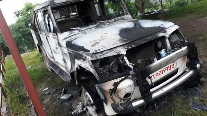 Unidentified group torches  government vehicle in Dang