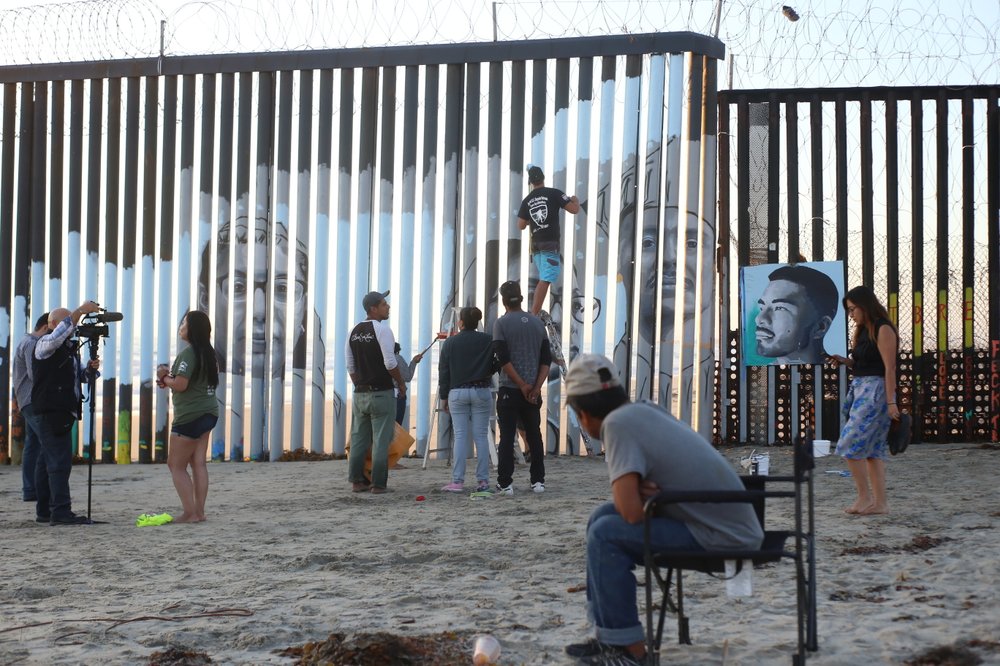 Interactive border wall mural tells stories of deported