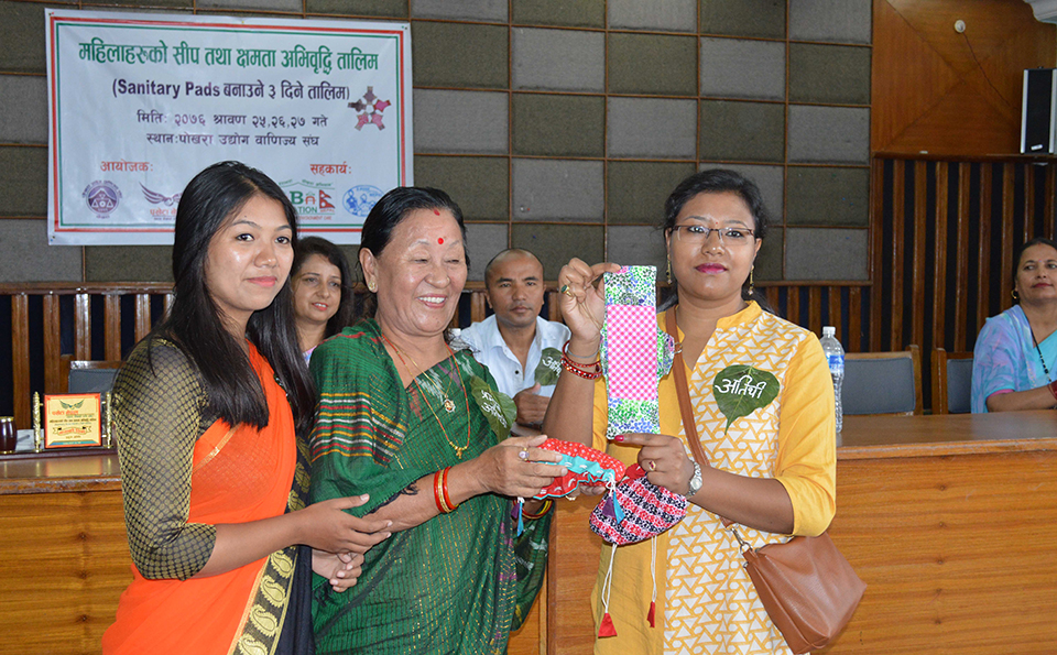 Women receive training to make sanitary pad