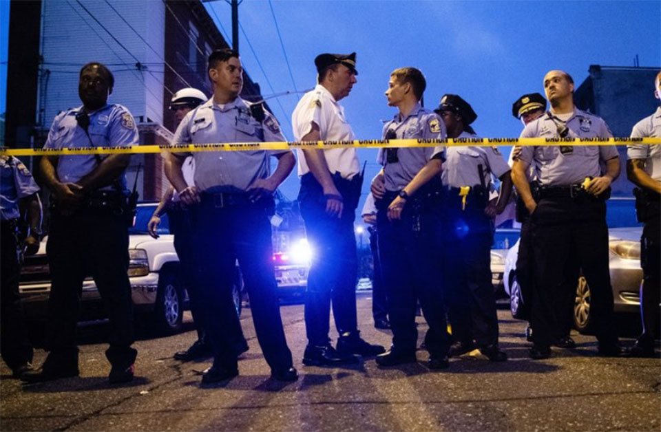 Gunman wounds at least 6 Philadelphia police; 2 others freed