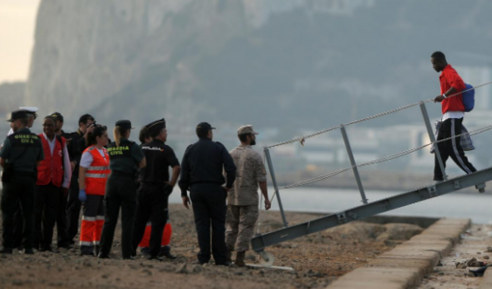 Over 150 migrants storm through Spain's enclave fence