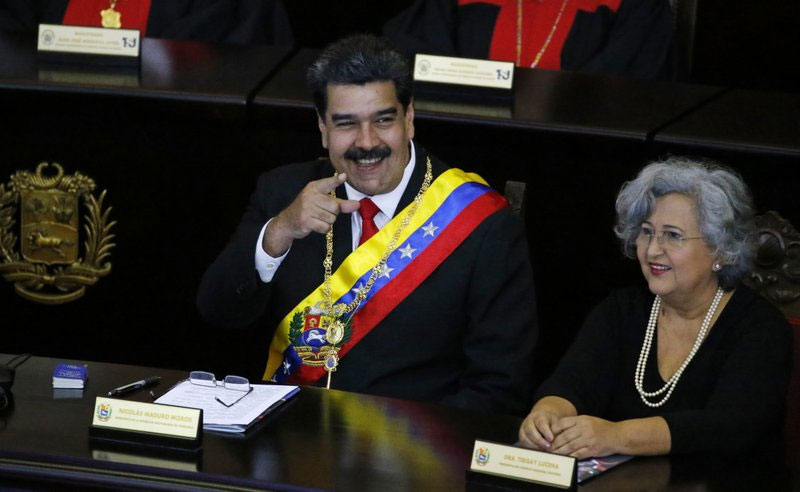 Backed by military, Venezuela’s Maduro hits back at rival