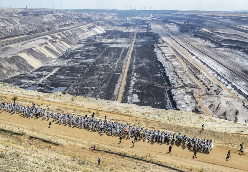 Climate activists block German mine despite orders to leave