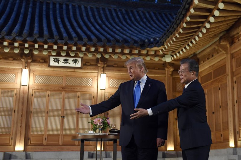 K-pop band greets Trump during Seoul visit