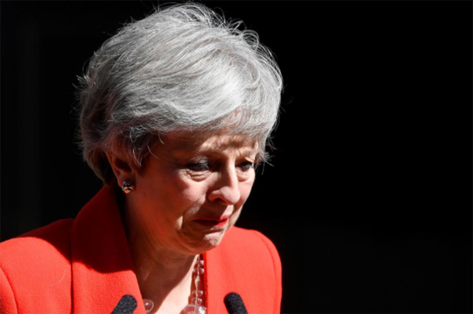 Tearful Theresa May resigns, paving way for Brexit confrontation with EU