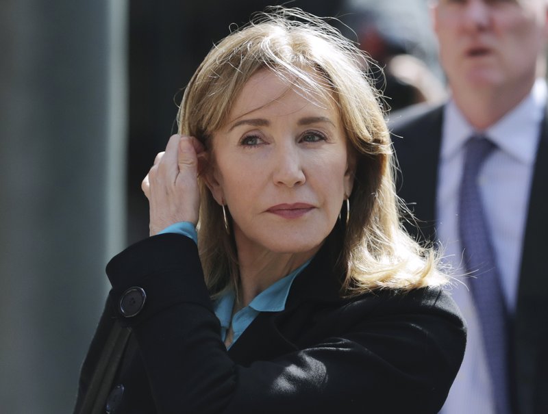Felicity Huffman to plead guilty in college admissions scam