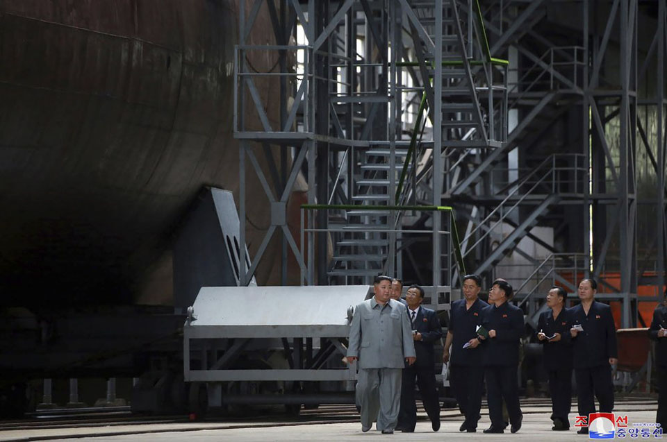 Kim inspects new submarine, wants NKorean military bolstered