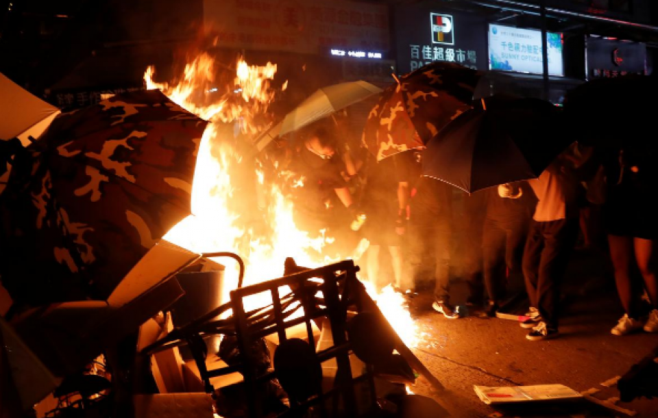 Hong Kong police fend off airport protest but tear gas fired again in Kowloon