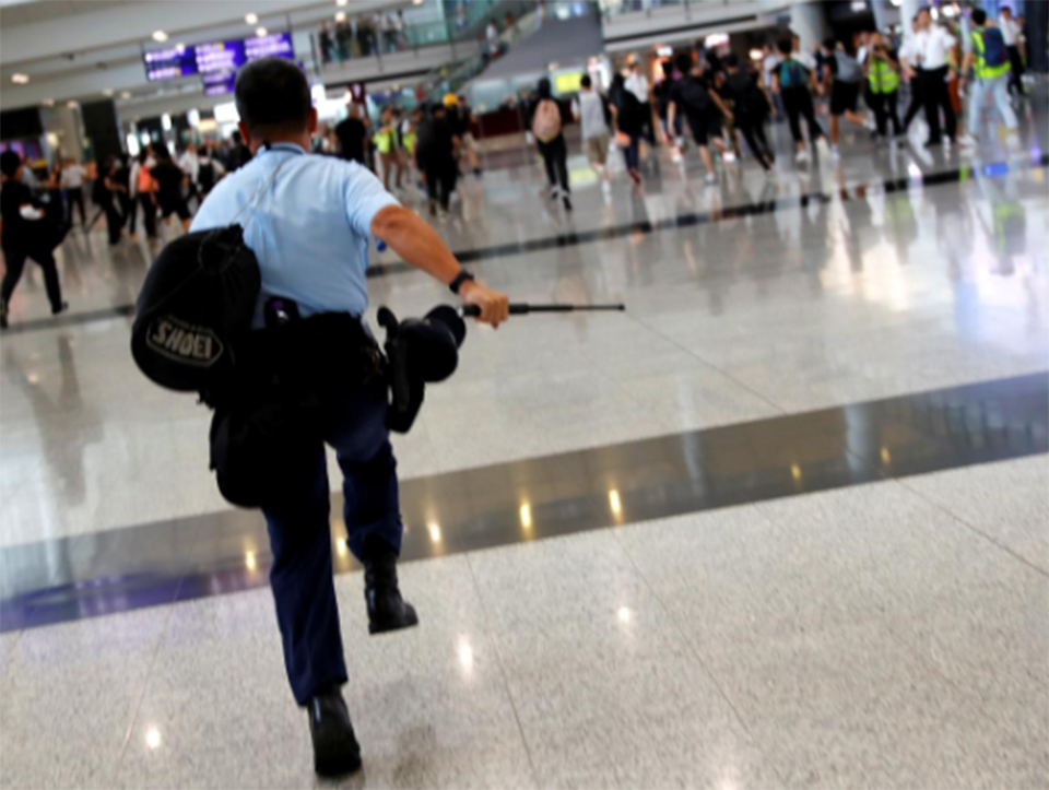 Hong Kong protesters plan to disrupt airport after night of chaos