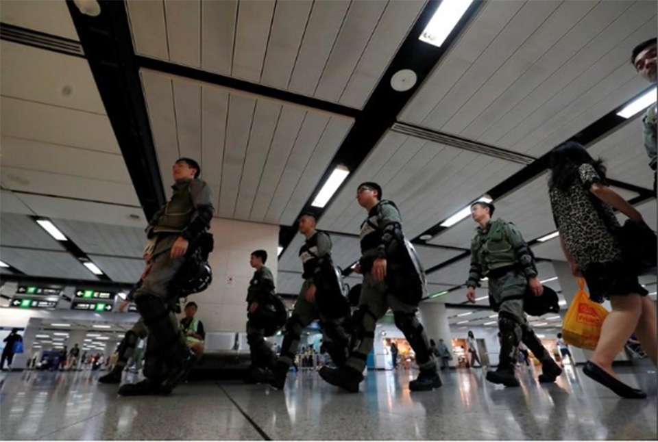 Hong Kong police in position at airport ahead of planned protest