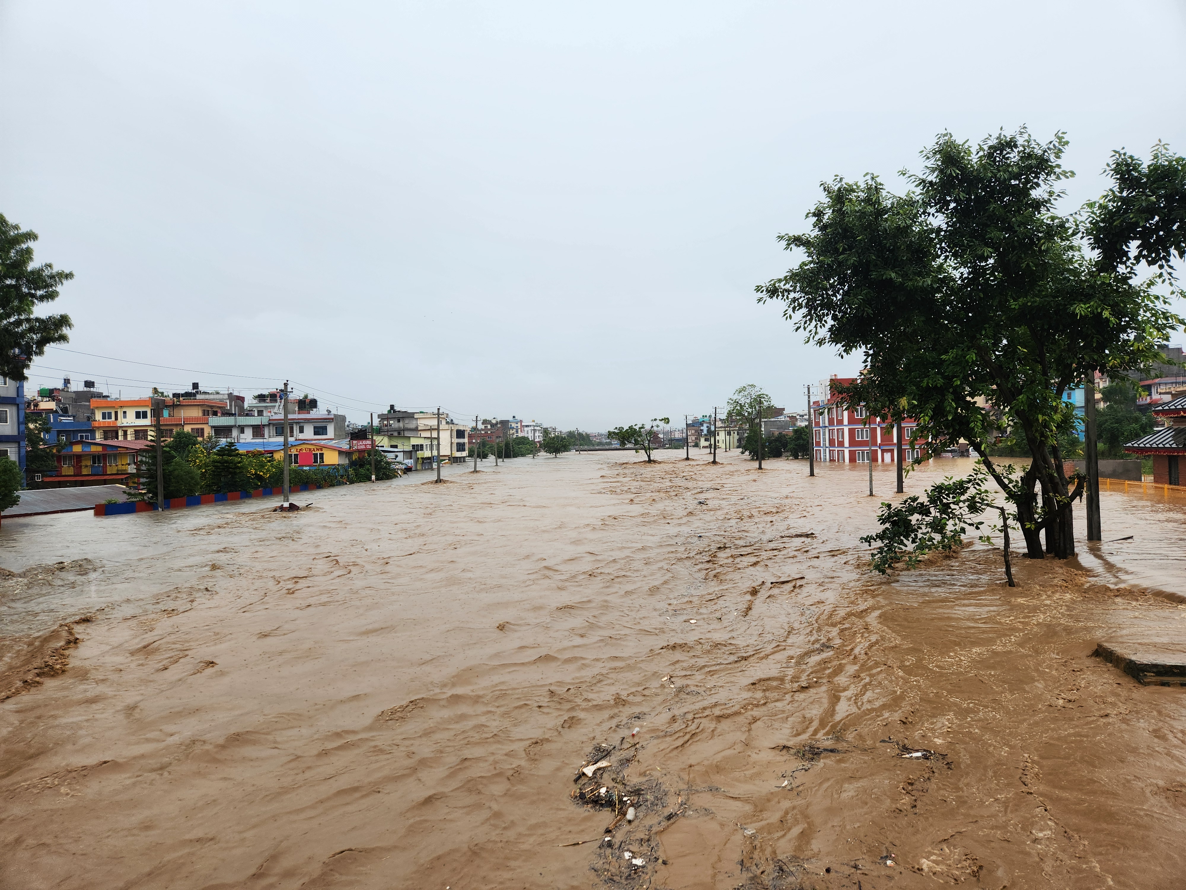 Swollen Manohara river enters human settlements in Imadol (With Photos)