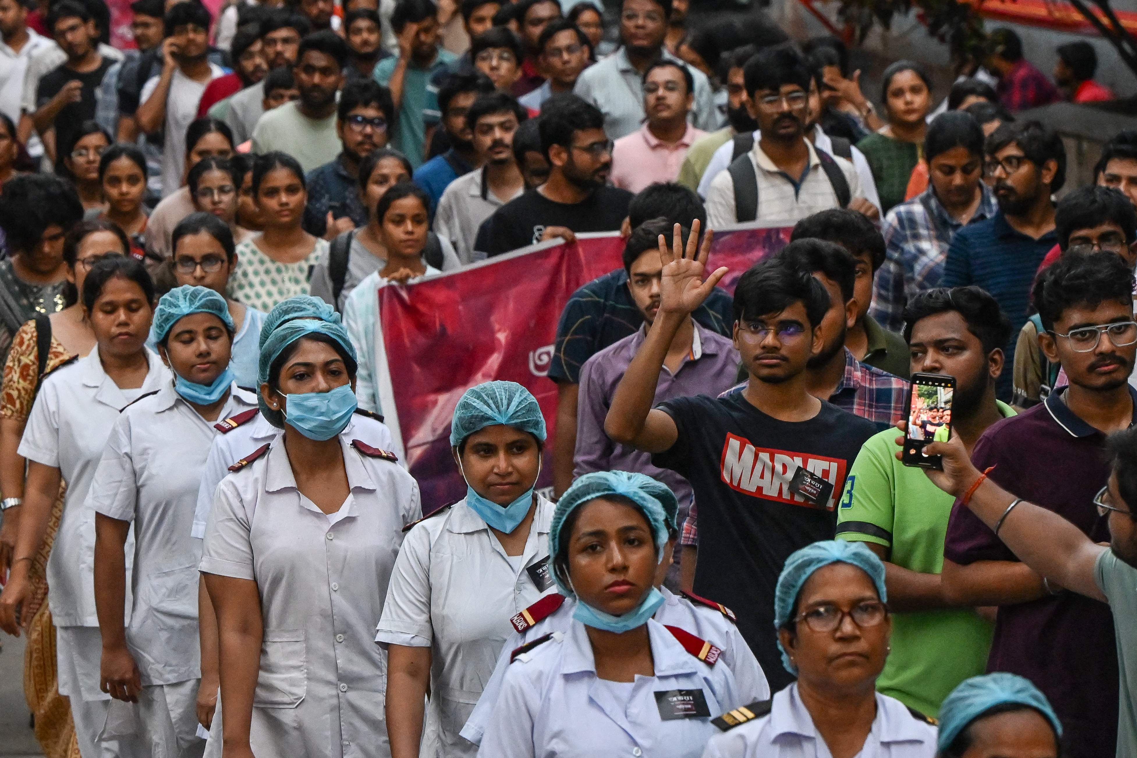 Indian doctors step up protests after colleague's brutal murder