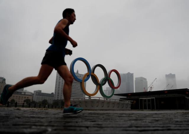 Tokyo goes to the polls as pandemic-shadowed Olympics loom