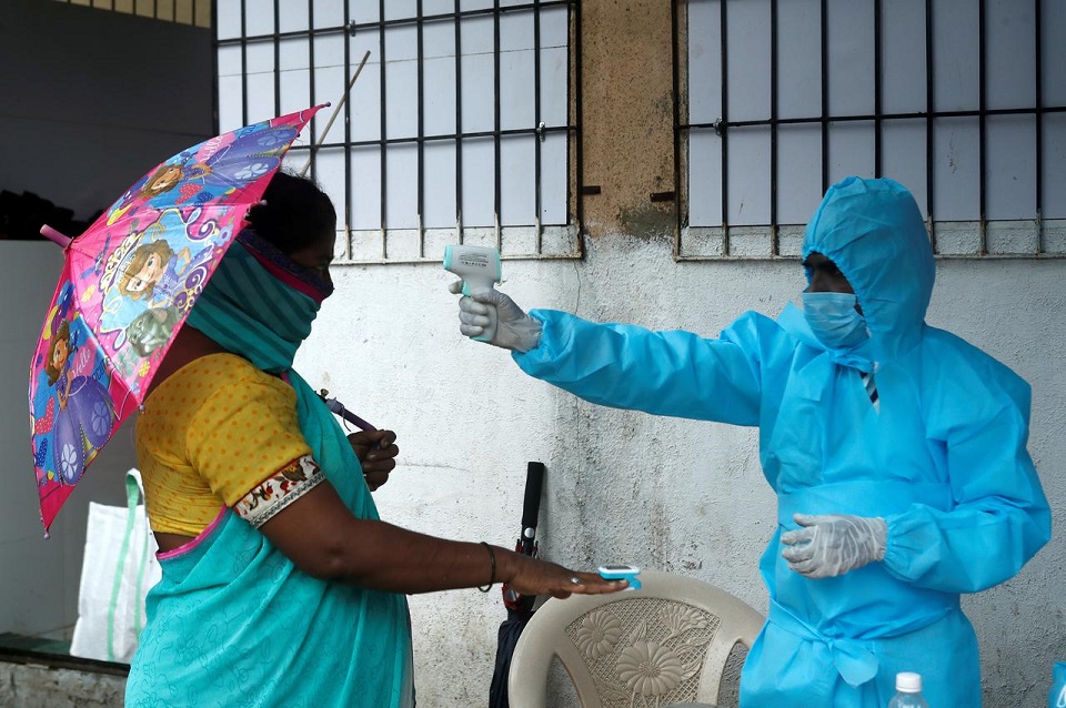 WHO reports record daily increase in global coronavirus cases, up more than 212,000
